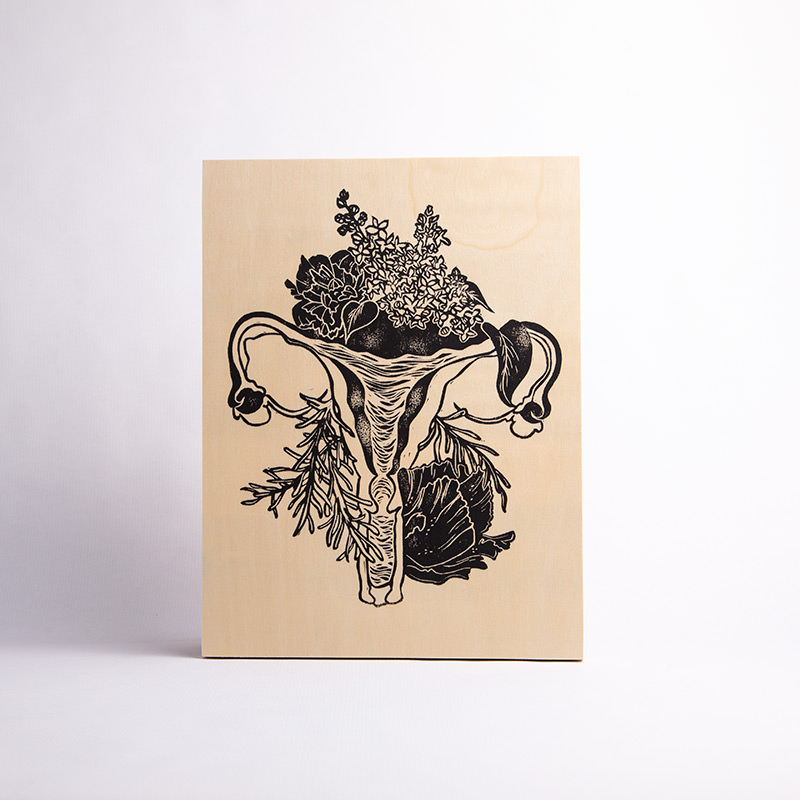 Maria Mulder's Floral Uterus linocut on wood panel